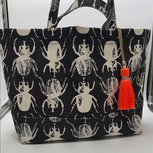 India Hicks Black & Cream Beetle Canvas Tote with Orange Tassel
